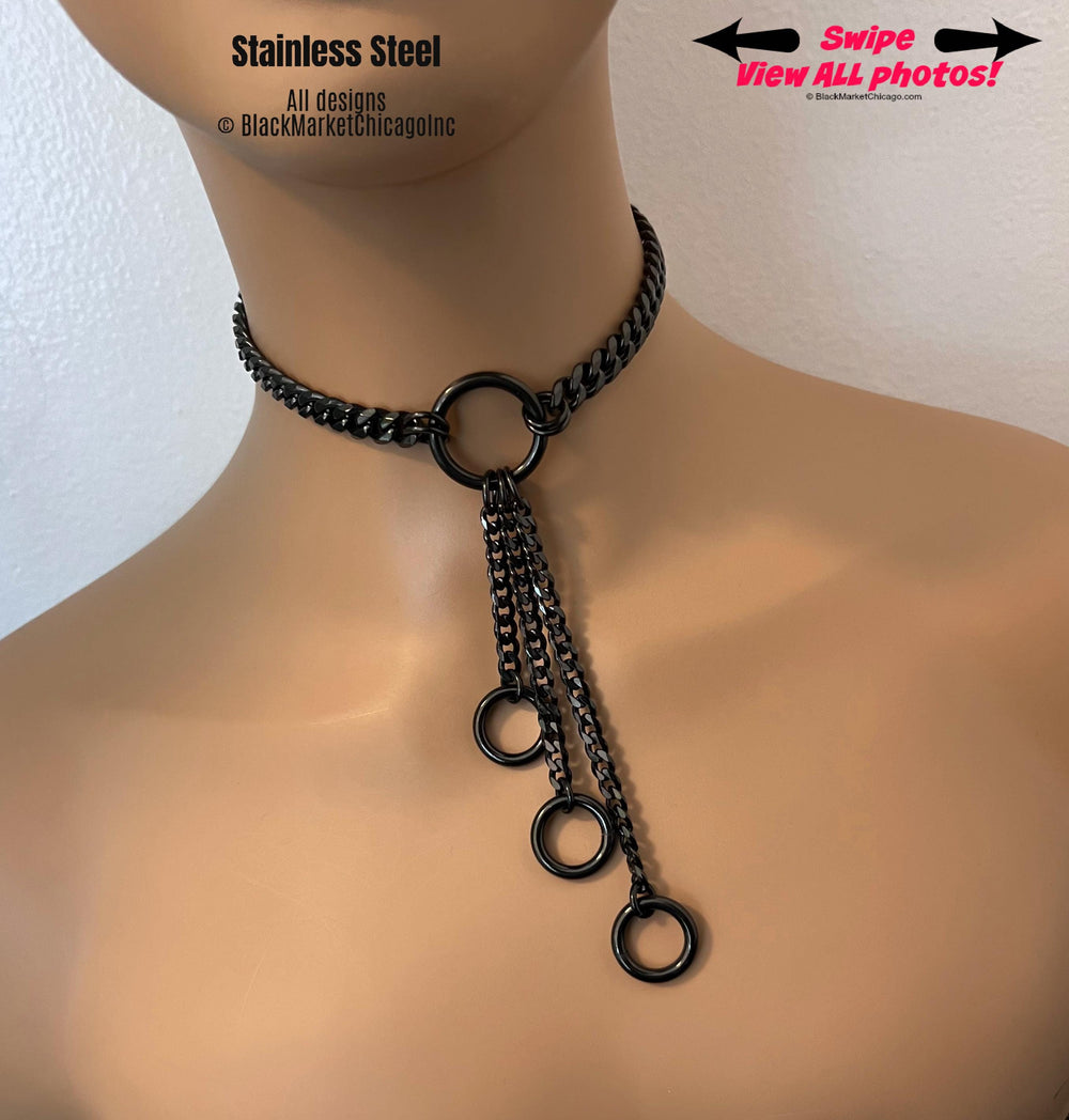 black stainless steel  choker; 1-inch center neck o-ring; black chain, cascading three graduated chains with solid thick o-rings at the end; heavy-ish, shiny, edy, streetwear choker necklace.