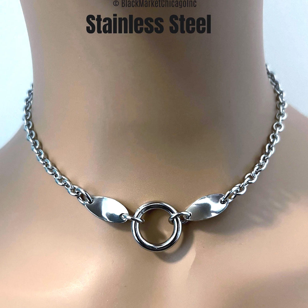 Shiny discreet bdsm sub day collar; 6mm cable stainless steel chain; it’s constant wear 24/7; 18mm center thick o-ring affixed with sturdy jump rings, adorned with oval twisted side stabilizing ornaments, and a permanent locking clasp option.